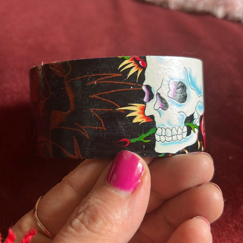 Ed Hardy cuff bracelets. There are 2 different ones.